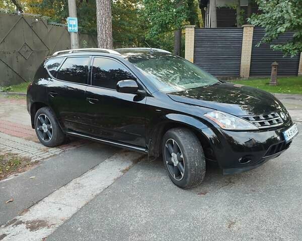 Черный Ниссан Мурано, объемом двигателя 3.5 л и пробегом 260 тыс. км за 8500 $, фото 5 на Automoto.ua