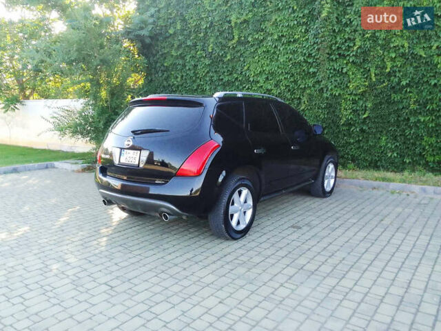 Черный Ниссан Мурано, объемом двигателя 3.5 л и пробегом 235 тыс. км за 6998 $, фото 7 на Automoto.ua