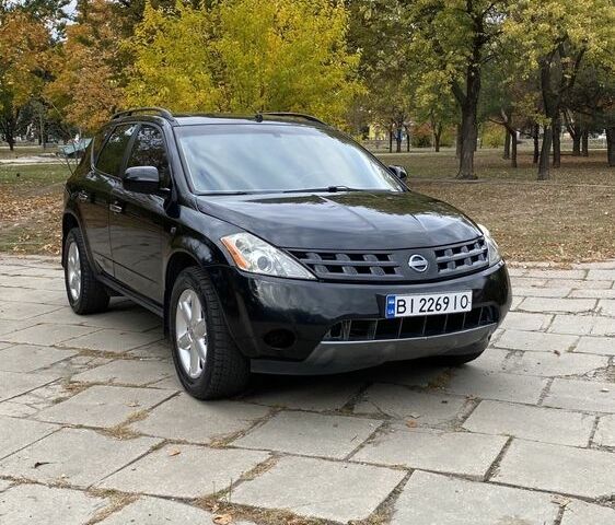 Чорний Ніссан Мурано, об'ємом двигуна 3.5 л та пробігом 259 тис. км за 4700 $, фото 2 на Automoto.ua