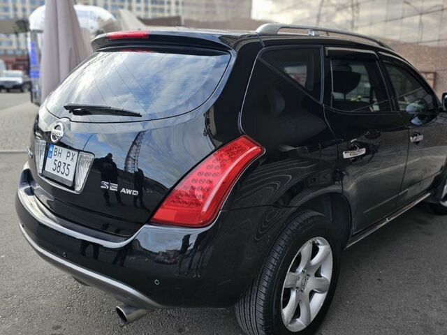 Черный Ниссан Мурано, объемом двигателя 3.5 л и пробегом 185 тыс. км за 5800 $, фото 2 на Automoto.ua
