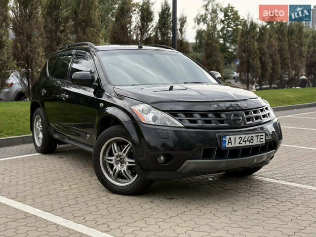 Черный Ниссан Мурано, объемом двигателя 3.5 л и пробегом 238 тыс. км за 6500 $, фото 4 на Automoto.ua