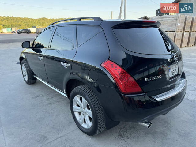 Черный Ниссан Мурано, объемом двигателя 3.5 л и пробегом 240 тыс. км за 5350 $, фото 11 на Automoto.ua
