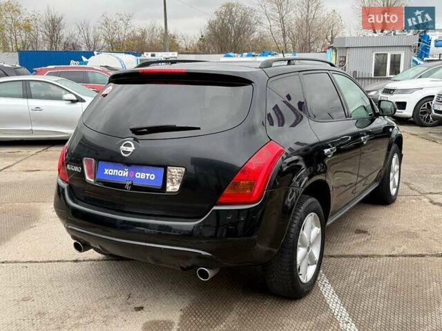 Черный Ниссан Мурано, объемом двигателя 3.5 л и пробегом 260 тыс. км за 7000 $, фото 4 на Automoto.ua