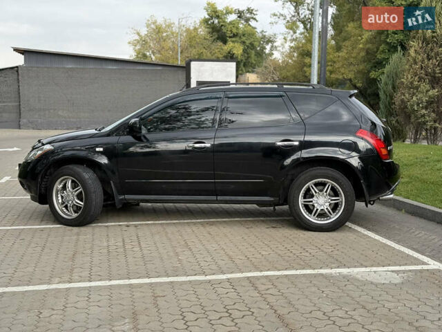 Черный Ниссан Мурано, объемом двигателя 3.5 л и пробегом 238 тыс. км за 6500 $, фото 16 на Automoto.ua