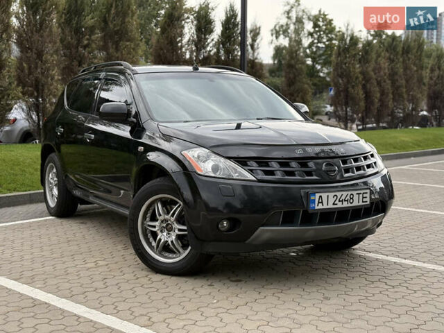 Черный Ниссан Мурано, объемом двигателя 3.5 л и пробегом 238 тыс. км за 6500 $, фото 5 на Automoto.ua