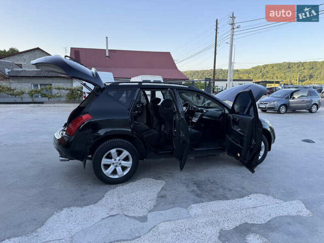 Черный Ниссан Мурано, объемом двигателя 3.5 л и пробегом 240 тыс. км за 5350 $, фото 37 на Automoto.ua