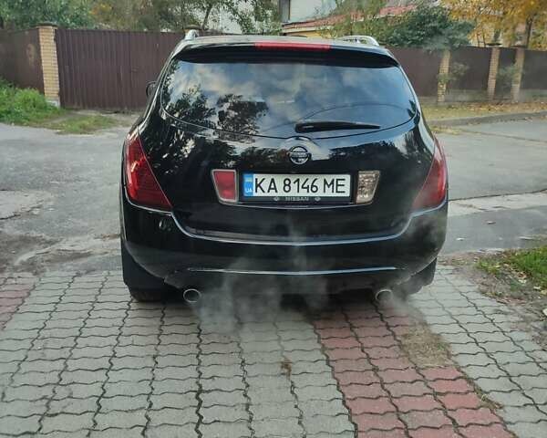 Черный Ниссан Мурано, объемом двигателя 3.5 л и пробегом 260 тыс. км за 8500 $, фото 1 на Automoto.ua