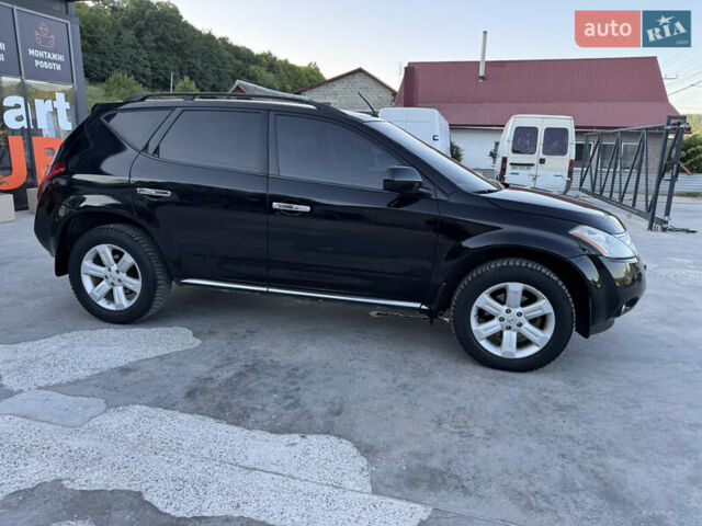 Черный Ниссан Мурано, объемом двигателя 3.5 л и пробегом 240 тыс. км за 5350 $, фото 5 на Automoto.ua