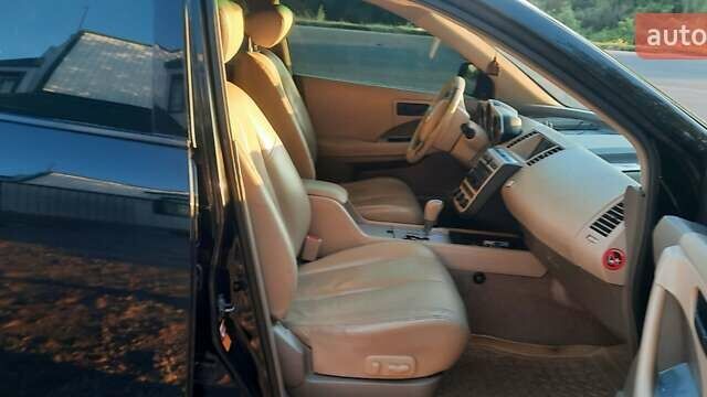 Черный Ниссан Мурано, объемом двигателя 3.5 л и пробегом 290 тыс. км за 7400 $, фото 17 на Automoto.ua