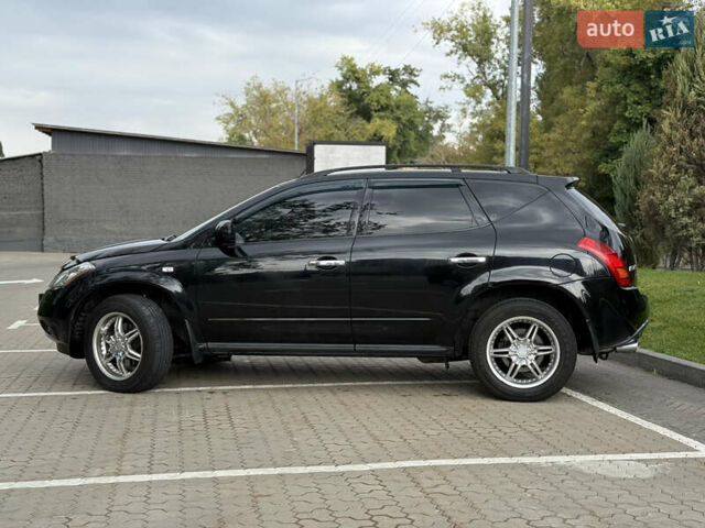 Черный Ниссан Мурано, объемом двигателя 3.5 л и пробегом 238 тыс. км за 6500 $, фото 15 на Automoto.ua
