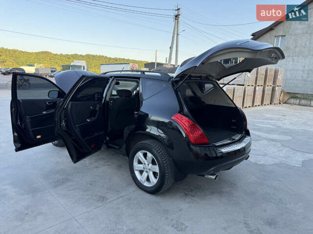 Черный Ниссан Мурано, объемом двигателя 3.5 л и пробегом 240 тыс. км за 5350 $, фото 35 на Automoto.ua
