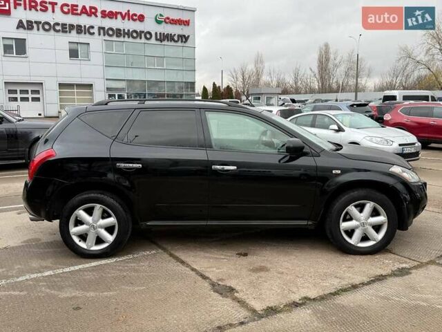 Черный Ниссан Мурано, объемом двигателя 3.5 л и пробегом 260 тыс. км за 7000 $, фото 3 на Automoto.ua