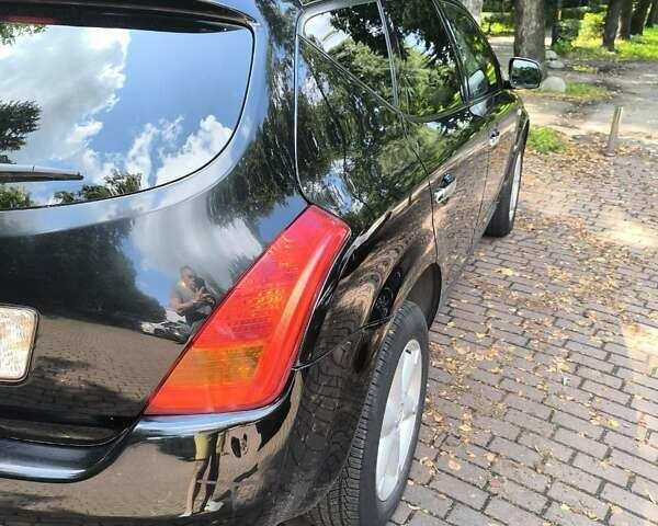Черный Ниссан Мурано, объемом двигателя 3.5 л и пробегом 144 тыс. км за 8300 $, фото 10 на Automoto.ua