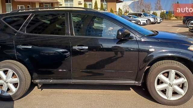 Черный Ниссан Мурано, объемом двигателя 3.5 л и пробегом 230 тыс. км за 8000 $, фото 1 на Automoto.ua