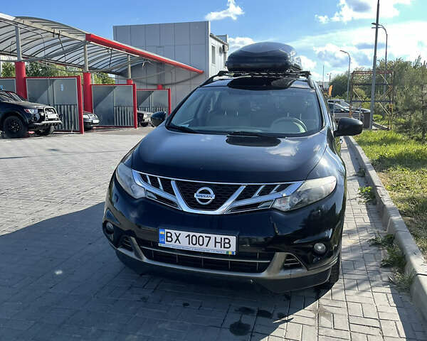 Черный Ниссан Мурано, объемом двигателя 2.49 л и пробегом 245 тыс. км за 15500 $, фото 1 на Automoto.ua