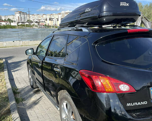 Черный Ниссан Мурано, объемом двигателя 2.49 л и пробегом 245 тыс. км за 15500 $, фото 9 на Automoto.ua