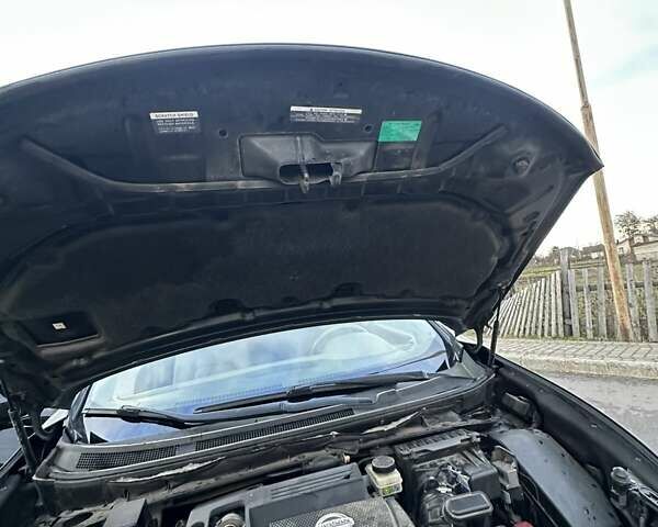 Черный Ниссан Мурано, объемом двигателя 2.49 л и пробегом 202 тыс. км за 13000 $, фото 48 на Automoto.ua