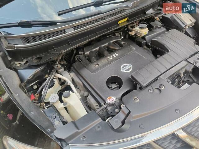 Черный Ниссан Мурано, объемом двигателя 3.5 л и пробегом 260 тыс. км за 11000 $, фото 67 на Automoto.ua