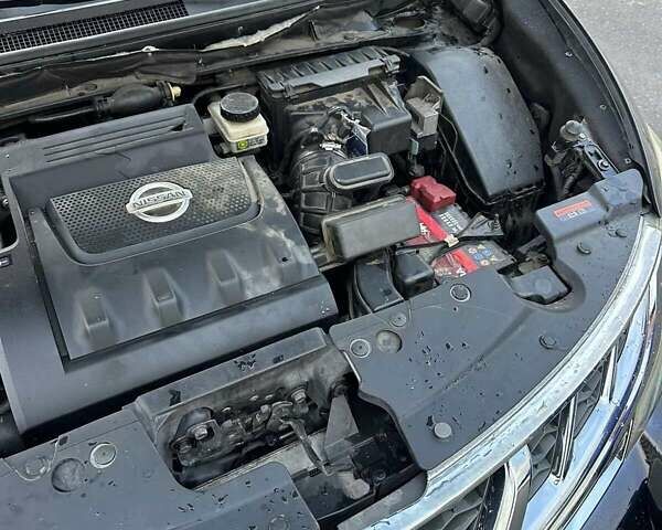 Черный Ниссан Мурано, объемом двигателя 2.49 л и пробегом 202 тыс. км за 13000 $, фото 51 на Automoto.ua