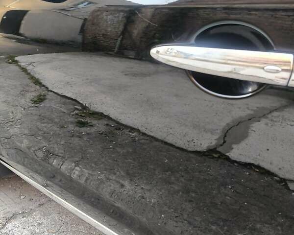 Черный Ниссан Мурано, объемом двигателя 3.5 л и пробегом 260 тыс. км за 11000 $, фото 2 на Automoto.ua