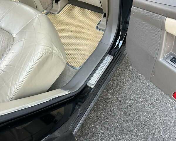 Черный Ниссан Мурано, объемом двигателя 2.49 л и пробегом 202 тыс. км за 13000 $, фото 40 на Automoto.ua