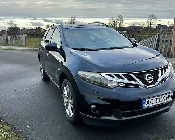 Черный Ниссан Мурано, объемом двигателя 2.49 л и пробегом 202 тыс. км за 13000 $, фото 3 на Automoto.ua