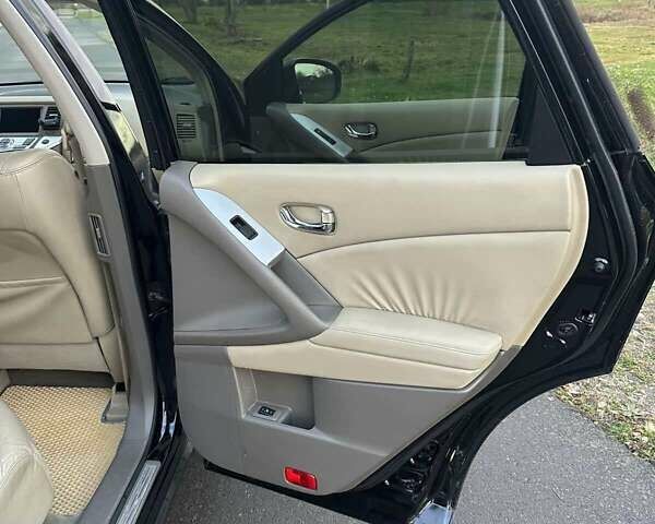 Черный Ниссан Мурано, объемом двигателя 2.49 л и пробегом 202 тыс. км за 13000 $, фото 42 на Automoto.ua