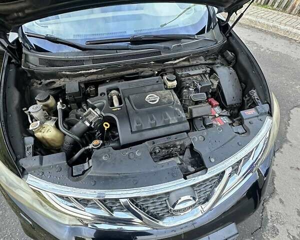 Черный Ниссан Мурано, объемом двигателя 2.49 л и пробегом 202 тыс. км за 13000 $, фото 52 на Automoto.ua