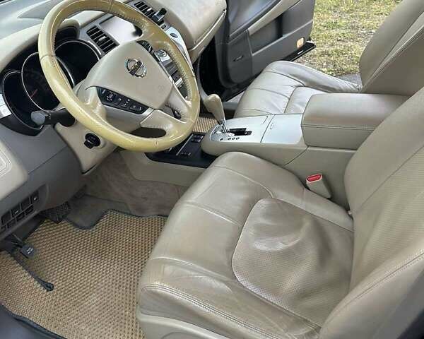 Черный Ниссан Мурано, объемом двигателя 2.49 л и пробегом 202 тыс. км за 13000 $, фото 25 на Automoto.ua