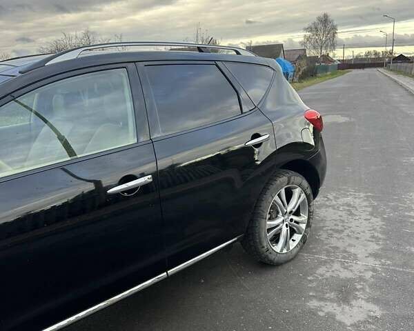 Черный Ниссан Мурано, объемом двигателя 2.49 л и пробегом 202 тыс. км за 13000 $, фото 7 на Automoto.ua