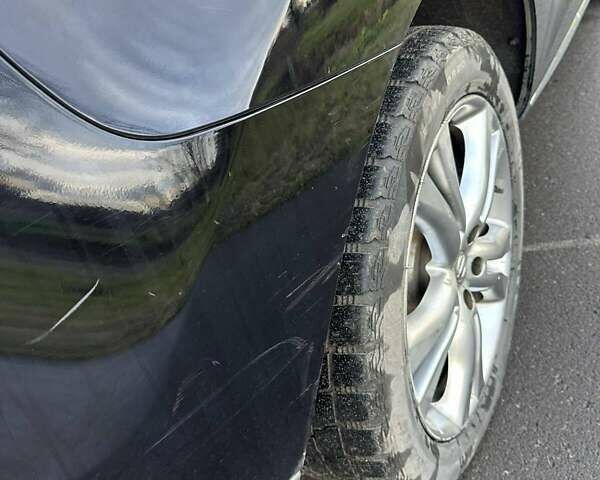 Черный Ниссан Мурано, объемом двигателя 2.49 л и пробегом 202 тыс. км за 13000 $, фото 11 на Automoto.ua