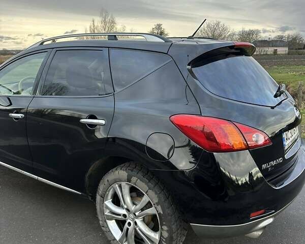 Черный Ниссан Мурано, объемом двигателя 2.49 л и пробегом 202 тыс. км за 13000 $, фото 5 на Automoto.ua