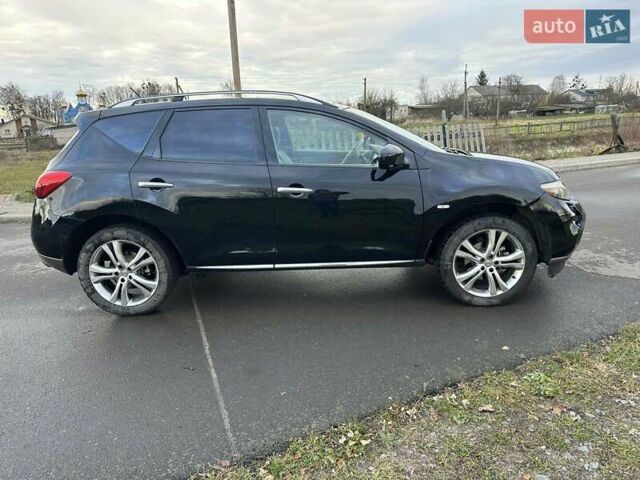 Черный Ниссан Мурано, объемом двигателя 2.49 л и пробегом 202 тыс. км за 13000 $, фото 2 на Automoto.ua