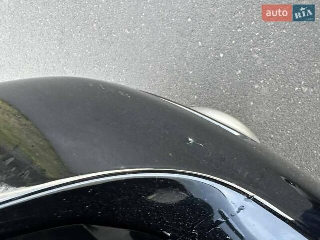 Черный Ниссан Мурано, объемом двигателя 2.49 л и пробегом 202 тыс. км за 13000 $, фото 12 на Automoto.ua