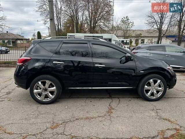 Черный Ниссан Мурано, объемом двигателя 2.49 л и пробегом 192 тыс. км за 12500 $, фото 4 на Automoto.ua