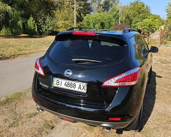 Черный Ниссан Мурано, объемом двигателя 3.5 л и пробегом 99 тыс. км за 12700 $, фото 3 на Automoto.ua