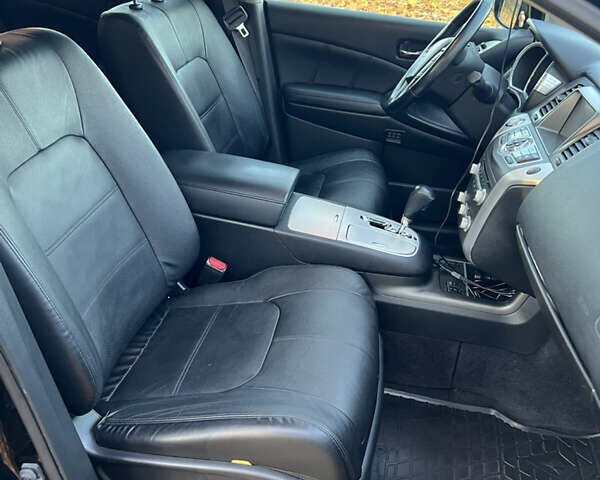 Черный Ниссан Мурано, объемом двигателя 2.49 л и пробегом 218 тыс. км за 16300 $, фото 37 на Automoto.ua