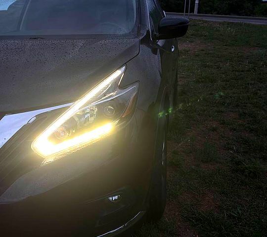 Черный Ниссан Мурано, объемом двигателя 3.5 л и пробегом 77 тыс. км за 17000 $, фото 2 на Automoto.ua