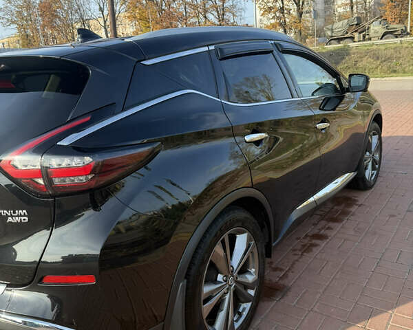 Черный Ниссан Мурано, объемом двигателя 3.5 л и пробегом 57 тыс. км за 21000 $, фото 2 на Automoto.ua