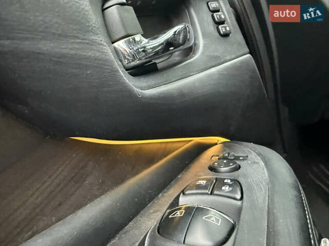 Черный Ниссан Мурано, объемом двигателя 3.5 л и пробегом 109 тыс. км за 12000 $, фото 19 на Automoto.ua