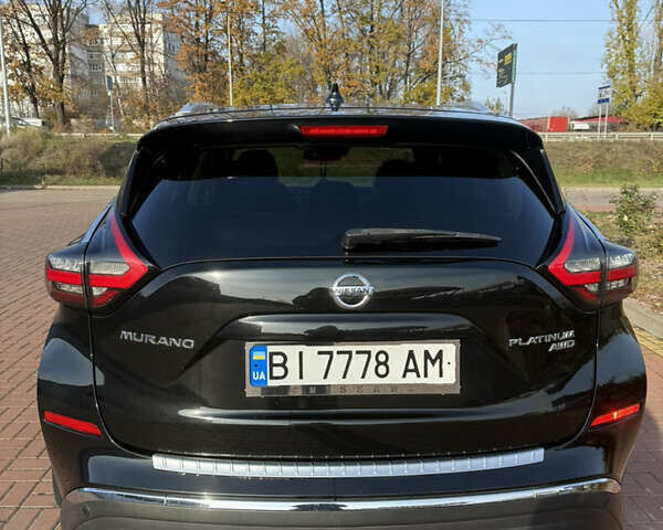 Черный Ниссан Мурано, объемом двигателя 3.5 л и пробегом 57 тыс. км за 21000 $, фото 1 на Automoto.ua