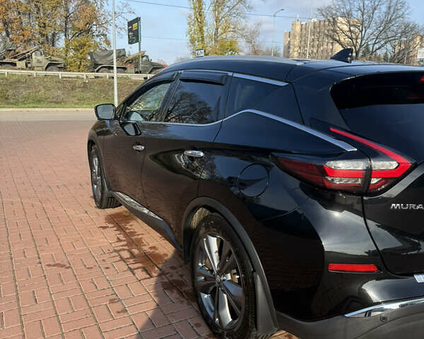 Черный Ниссан Мурано, объемом двигателя 3.5 л и пробегом 57 тыс. км за 21000 $, фото 3 на Automoto.ua