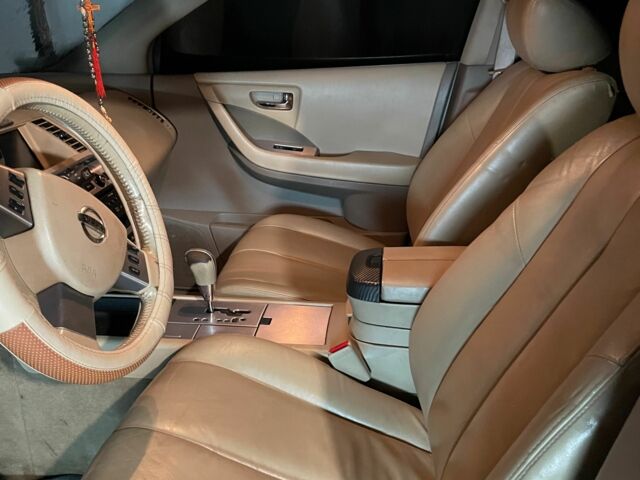 Красный Ниссан Мурано, объемом двигателя 3.5 л и пробегом 140 тыс. км за 8000 $, фото 2 на Automoto.ua