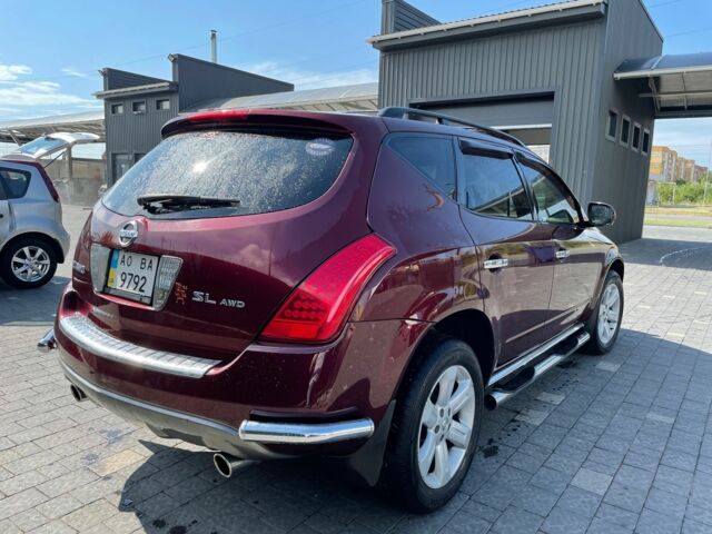 Красный Ниссан Мурано, объемом двигателя 3.5 л и пробегом 140 тыс. км за 8000 $, фото 1 на Automoto.ua
