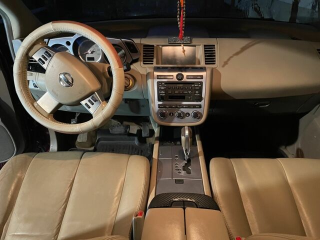 Красный Ниссан Мурано, объемом двигателя 3.5 л и пробегом 140 тыс. км за 8000 $, фото 4 на Automoto.ua