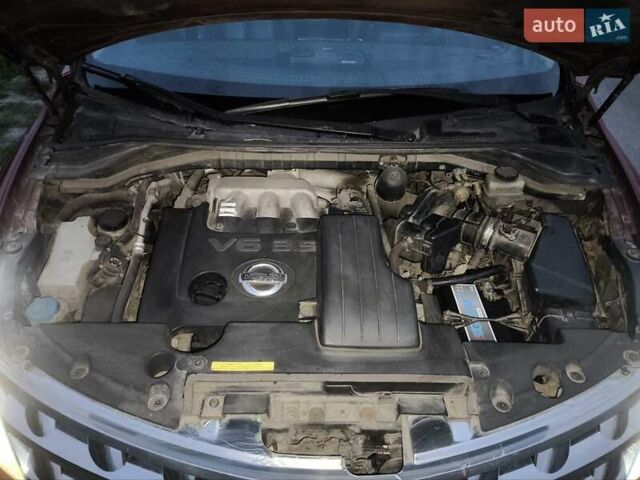 Красный Ниссан Мурано, объемом двигателя 3.5 л и пробегом 250 тыс. км за 5600 $, фото 17 на Automoto.ua