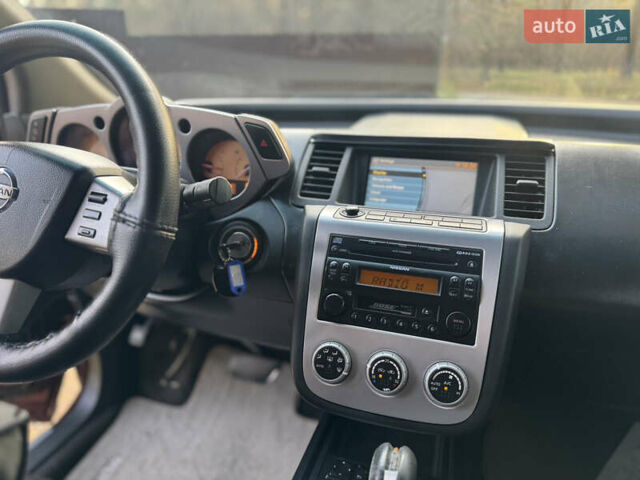 Красный Ниссан Мурано, объемом двигателя 3.5 л и пробегом 235 тыс. км за 5500 $, фото 8 на Automoto.ua