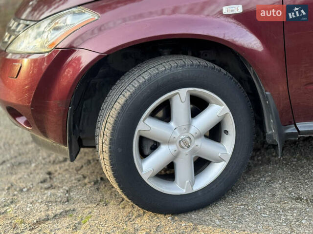 Красный Ниссан Мурано, объемом двигателя 3.5 л и пробегом 235 тыс. км за 5500 $, фото 2 на Automoto.ua