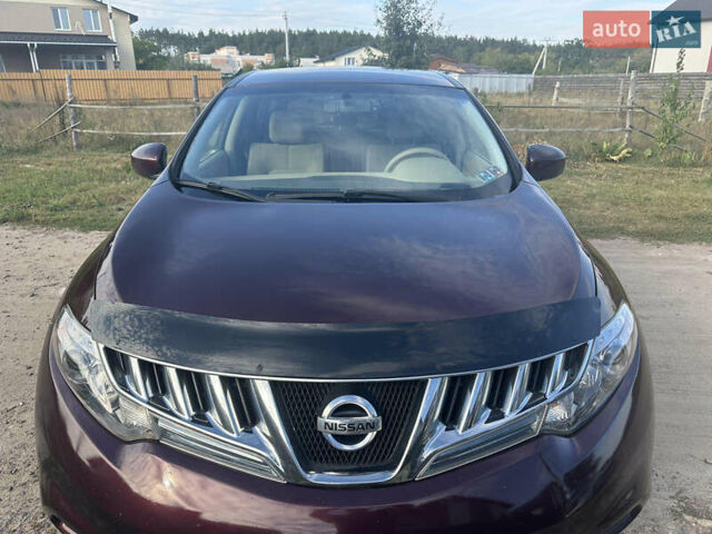 Красный Ниссан Мурано, объемом двигателя 3.5 л и пробегом 129 тыс. км за 9900 $, фото 2 на Automoto.ua