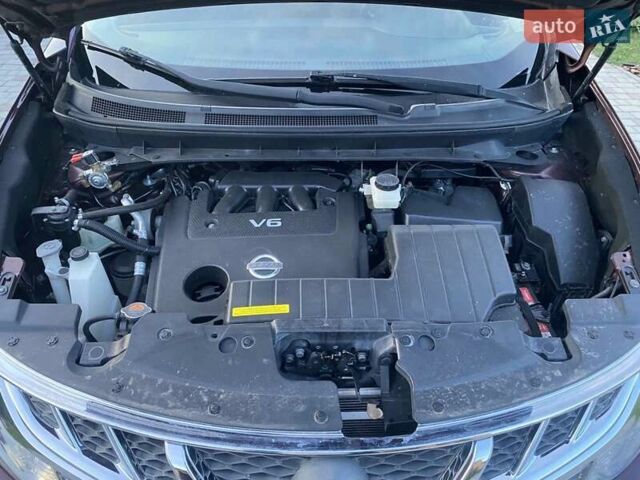 Красный Ниссан Мурано, объемом двигателя 3.5 л и пробегом 229 тыс. км за 10999 $, фото 10 на Automoto.ua